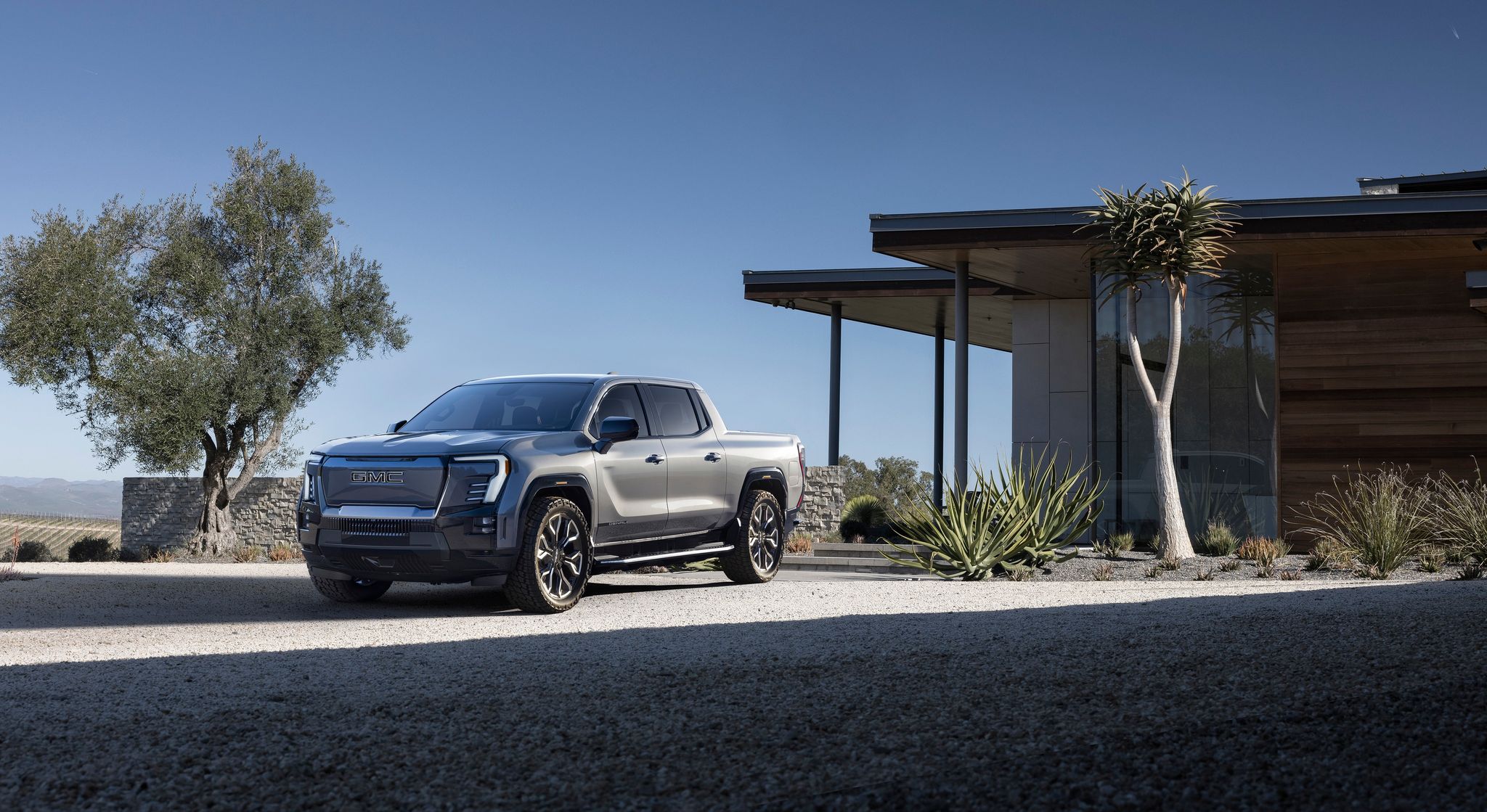 The first-ever GMC Sierra EV Denali Edition 1 from a front 3/4 view. GMC Sierra EV